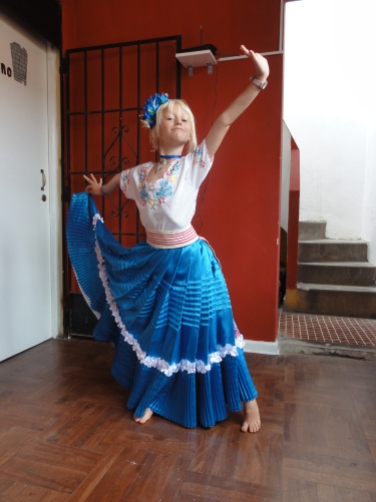 trying out a Marinera costume in Lima